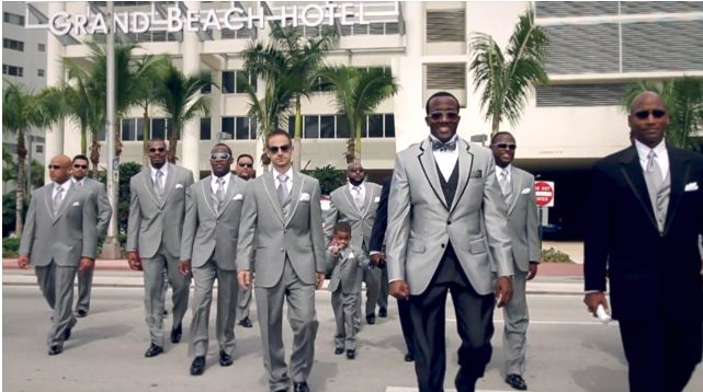 Miami news anchor Donovan Campbell and his groomsmen in grey make for a 